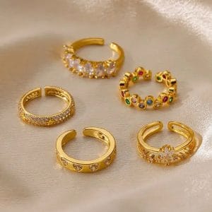 Alternative view of ANILLO "CONFETTI" CON ZIRCONIAS EN ACERO INOXIDANLE DORADO