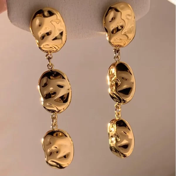 ARETES LARGOS "AGUA" EN ACERO INOXIDABLE Y CHAPADO EN ORO DE 16K