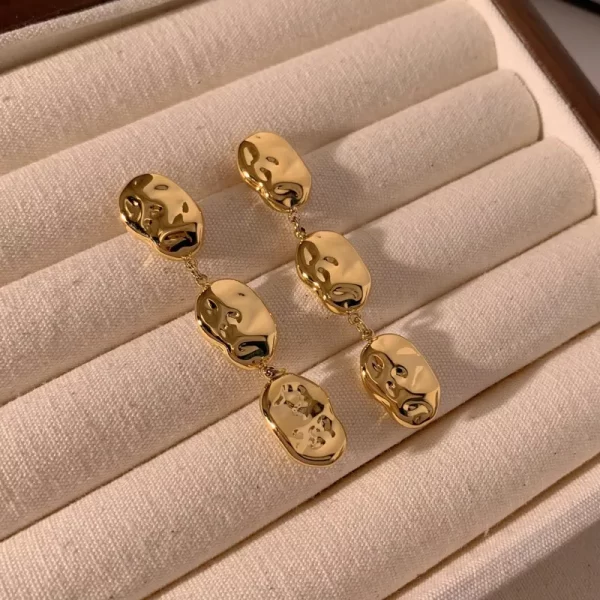 ARETES LARGOS "AGUA" EN ACERO INOXIDABLE Y CHAPADO EN ORO DE 16K - Imagen 2