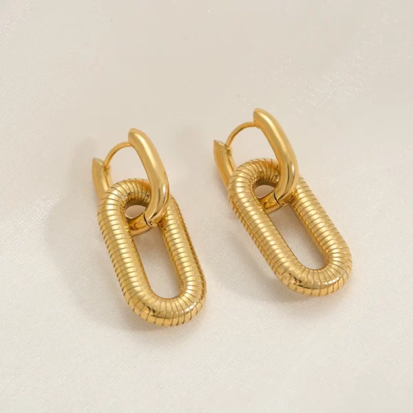 ARETES "RESORTE" EN ACERO INOXIDABLE Y CHAPADO EN ORO DE 18K
