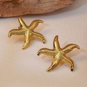 ARETES DE ESTRELLA DE MAR EN ACERO INOXIDABLE DORADO