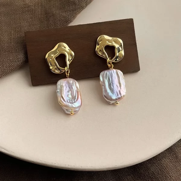 ARETES "NEREIDA" CON PERLA NATURAL Y POSTE DE PLATA DE 925