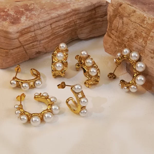 ARRACADAS "PAPIRO" EN ACERO INOXIDABLE Y CHAPADO EN ORO DE 18K - Imagen 3