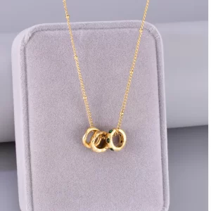 COLLAR "AROS" EN ACERO INOXIDABLE Y CHAPADO EN ORO DE 18K