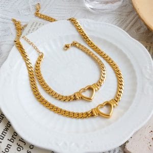 Alternative view of PULSERA DE ESLABÓN"CUBANA" EN ACERO INOXIDABLE Y CHAPADO EN ORO DE 18K