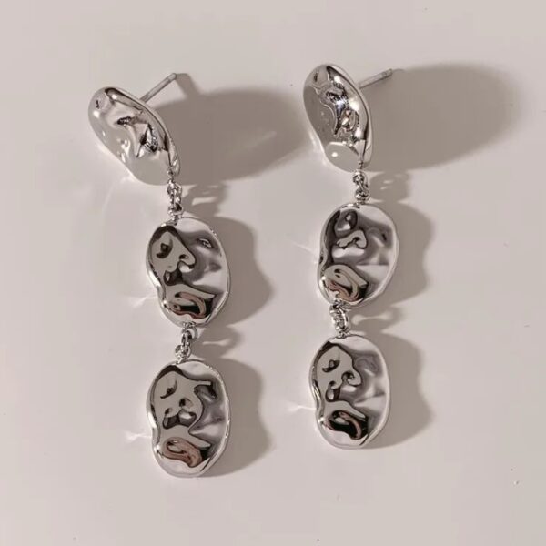 Aretes "Agua" en Color Plata de Acero Inoxidable y Chapdo en Oro de 16K