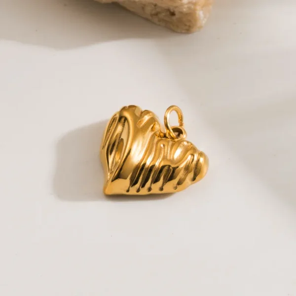 Charm "Melting Heart" en Acero Inoxidable y Chapado en Oro de 14K