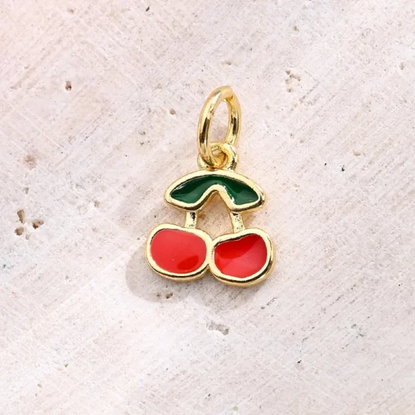 Charm "Cherry" en Cobre y chapado en Oro de 18K