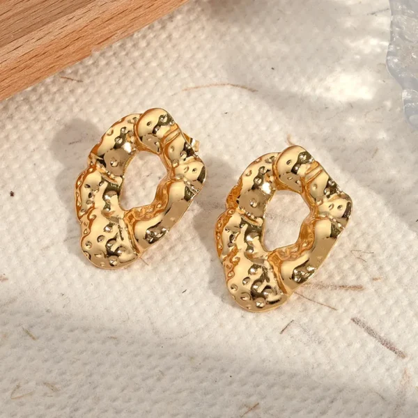 Aretes Forma Viva en Acero Inoxidable Dorado
