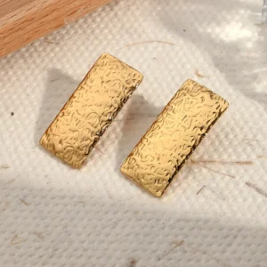Aretes " Pergamino" en Acero Inoxidable Dorado