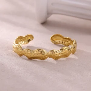 Brazalete "Peanuts" en Acero Inoxible y Chapado en Oro de 18K