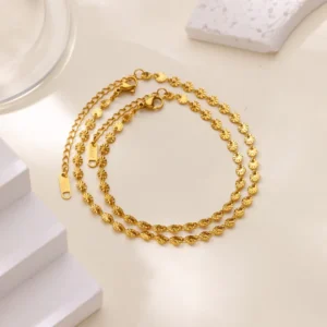 Alternative view of Pulsera "Coins" en Acero Inoxidable de Titanio Dorado