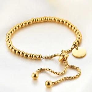 Pulsera "Golden Dots" en Acero de Titanio y Chapado en Oro de 18K