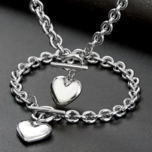 Set de Collar y Pulsera de Eslabón con Colgante de Corazón en Acero Inoxidable Color Plata