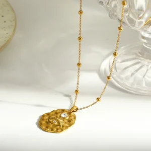 Collar "Oculus" Con Zirconia en Acero Inoxidable y Chapado en Oro de 18K