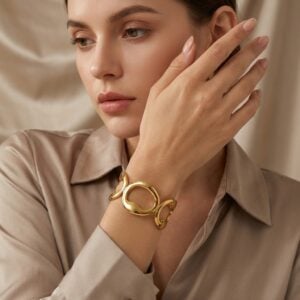 Brazalete "Continuum en Acero Inoxidable Dorado