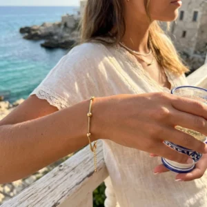 Pulsera Minimalista con Pequeñas Esferas en Acero Inoxidable y Chapado en Oro de 18K
