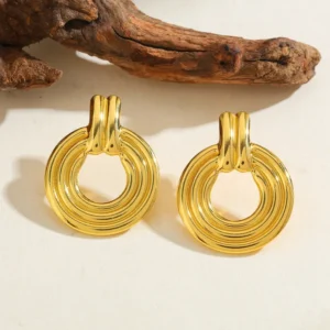 Aretes "Rueda" en Acero Inoxidable Quirúrjico