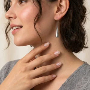 Aretes “Pendulum” en Acero Inoxidable y Chapados en Oro de 18K