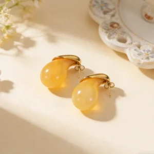 Aretes "Poire"en Acero Inoxidable y Chapado en Oro de 18K