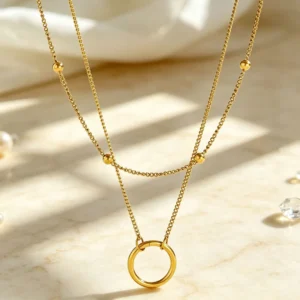 Collar de Cadena Doble "Aro" en Acero Inoxidable Dorado